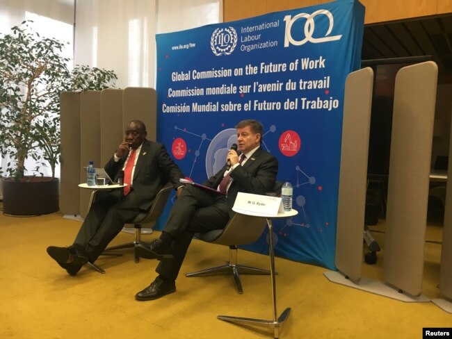 South African President Cyril Ramaphosa and International Labour Organization Director-General Guy Ryder launch the report of the Global Commission on the Future of Work at a news conference held at ILO headquarters in Geneva, Jan. 22, 2019.