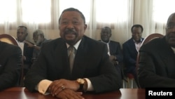 FILE - Gabon opposition leader Jean Ping attends a meeting with advisers in Libreville, Gabon, Sept. 26, 2016.