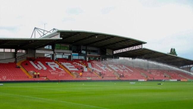 This photo provided by Wrexham FC shows the empty stands of the Racecourse Ground in Wrexham, Wales, Saturday, Sept. 11, 2021.