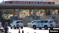 Xe của Liên Hiệp Quốc vào Syria tại cửa khẩu Cilvegozu ở tỉnh Hatay, Thổ Nhĩ Kỳ, ngày 16/9/2016.