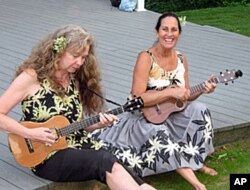 The Hula Honeys, Robin Kneubuhl and Ginger Johnson, record on the Ululoa label and combine contemporary jazz with traditional Hawaiian sounds.