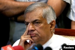 Sri Lanka's ousted Prime Minister Ranil Wickremesinghe reacts during a news conference in Colombo, Sri Lanka Oct. 27, 2018.