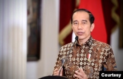 Presiden Jokowi dalam telekonferensi pers di Istana Merdeka, Jakarta, Senin (30/8) tetap melanjutkan kebijakan PPKM per level hingga 6 September meskipun situasi pandemi COVID-19 diklaim membaik (Biro Setpres)