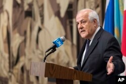 Palestinian Ambassador Riyad Mansour speaks to reporters about the situation in Israel outside the Security Council chambers, July 24, 2017, at U.N. headquarters.