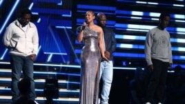 Nathan Morris, from left, Wanya Morris, Shawn Stockman, of Boyz II Men‎, and Alicia Keys, second left, sing a tribute in honor of the late Kobe Bryant at the 62nd annual Grammy Awards on Sunday, Jan. 26, 2020, in Los Angeles. (Photo by Matt Sayles/Invision.AP)