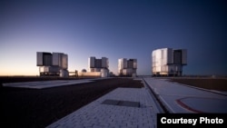 This image of the Paranal platform of the Four Unit Telescopes of the Very Large Telescope was taken right after sunset. (Credit: ESO/H.H.Heyer)