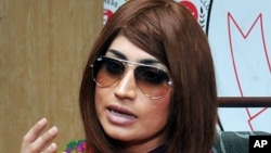 FILE - Pakistani fashion model Qandeel Baloch speaks during a press conference in Lahore, Pakistan, June 28, 2016.