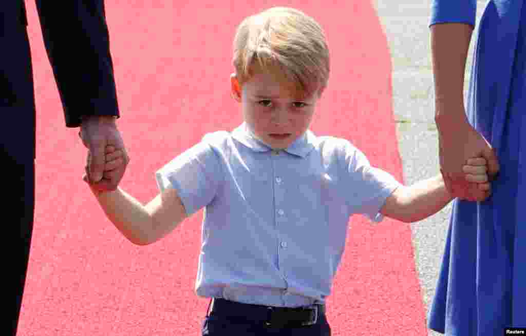 Prince George arrives at Tegel airport in Berlin, Germany.