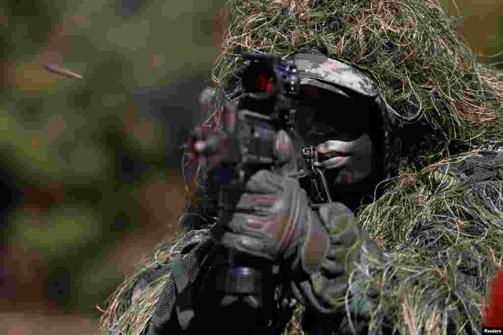 A South Korean marine participates in a regular drill on Yeonpyeong Island.