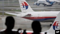 Malaysia Airlines, aéroport international de Kuala Lumpur, Malaisie, le 14 mars 2016. (AP Photo/Joshua Paul) 