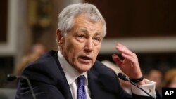 FILE - Secretary of Defense nominee Chuck Hagel testifies before the Senate Armed Services Committee during his confirmation hearing on Capitol Hill in Washington, Jan. 31, 2013.