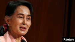 The government says on Sept. 29, 2016, Myanmar leader Aung San Suu Kyi has returned to the country's capital after a brief illness following her visit to the United States.