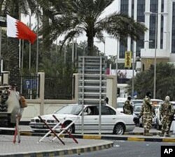 Troops are seen guarding one of the entrances of Salmaniya Hospital in Manama, Bahrain, March 18, 2011