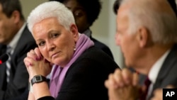 FILE - White House adviser Gayle Smith, attending a meeting with Vice President Joe Biden, on President Barack Obama administration’s response to Ebola in the Eisenhower Executive Office Building at the White House compound in Washington, Nov. 13, 2014.
