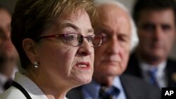 Rep. Marcy Kaptur (foreground) and Rep. Sander Levin (center) of the Congressional Ukraine Caucus are seen at a news conference on Capitol Hill in Washington, Feb. 5, 2015.