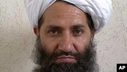 FILE - Afghan leader Hibatullah Akhundzada is pictured in this undated photo, taken in an unknown location. From appointing ministers and judges to selecting district administrators, Akhundzada decides everything in the Taliban regime.
