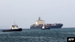 FILE - Ships are seen in the Gulf of Oman, Feb. 25, 2019.