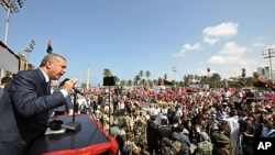 Turkish Prime Minister Recep Tayyip Erdogan addresses Libyans at Tripoli Airport, September 16, 2011.