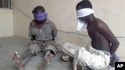 Suspected Boko Haram militants detained by military in Bukavu Barracks, Kano state, Nigeria, March 2012 file photo.