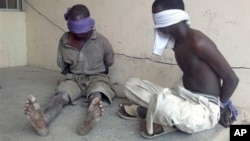 Suspected Boko Haram militants detained by military in Bukavu Barracks, Kano state, Nigeria, March 2012 file photo.