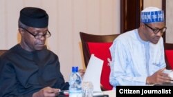 Shugaba Buhari da Mataimakinsa Farfasa Osinbajo suna nazari kan kasafin kudi