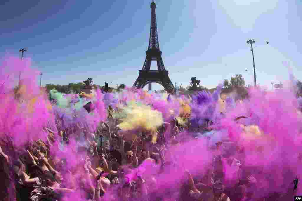 People participate in the &quot;Color Run 2015&quot; in Paris, France.