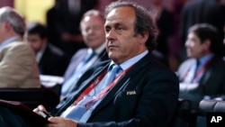 UEFA President Michel Platini waits for the beginning of the preliminary draw for the 2018 soccer World Cup in Konstantin Palace in St. Petersburg, Russia, July 25, 2015.