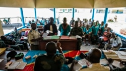 FILE—Musenu Tshilayi (2nd R, standing), a Congolese Major Sergeant accused of rape, at the Military Tribunal of Kinshasa during the trial of MINUSCA (United Nations Multidimensional Integrated Stabilization Mission in the Central African Republic) soldiers on April 4, 2016.