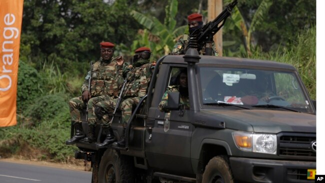 Soldiers patrol outside the entrance of Bafoussam stadium, Bafoussam, Cameroon, Jan. 14, 2022.