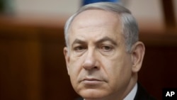 Israeli Prime Minister Benjamin Netanyahu attends the weekly cabinet meeting in his Jerusalem office on June 2, 2013. 