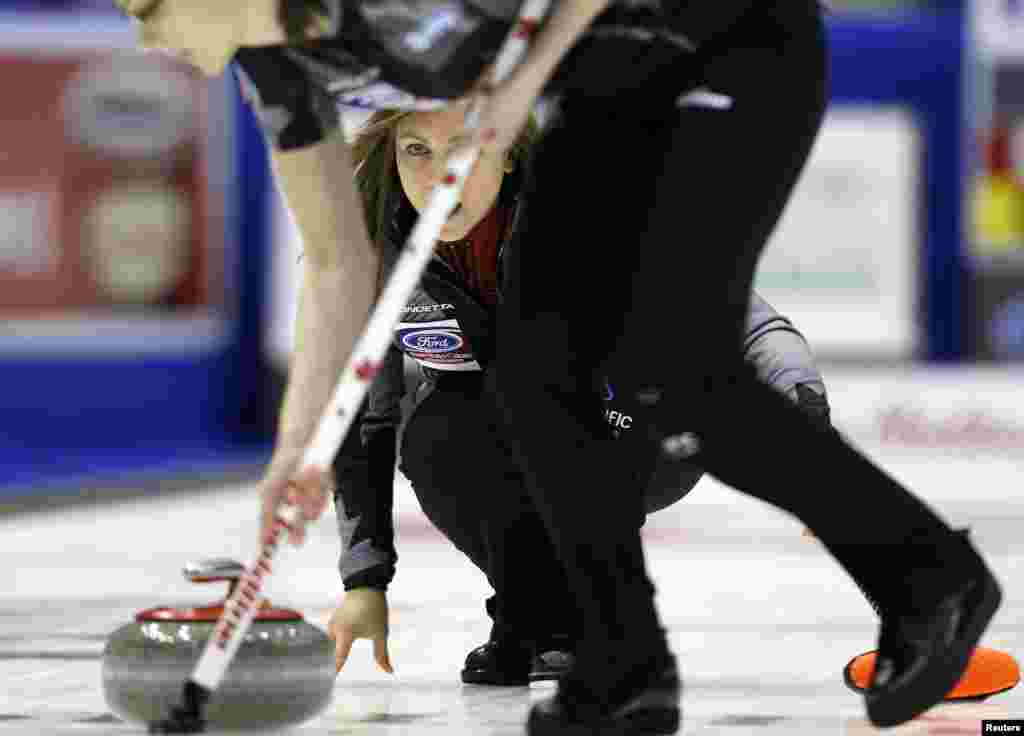 Canada&#39;s skip Rachel Homan delivers a stone during her draw against Germany at the World Women&#39;s Curling Championships in Saint John, New Brunswick, Canada.