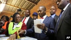 FILE: Zimbabwe's main opposition leader Nelson Chamisa casts his vote at a polling station in Harare, Zimbabwe, Monday, July 30, 2018. Zimbabwe votes in an election that could, if deemed credible, tilt the country toward recovery after years of economic collapse and repression under former leader Robert Mugabe. (AP Photo/Tsvangirayi Mukwazhi)