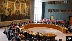 Members of the U.N. Security Council gather inside the United Nations Security Council chambers for a meeting on Syria, April 30, 2019.