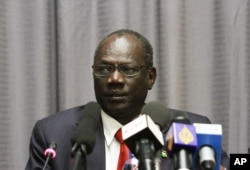 FILE - South Sudanese information minister, Michael Makuei Lueth attends a press conference in Addis Ababa, Jan. 5, 2014.