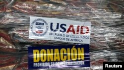 Bantuan kemanusiaan dari USAID untuk Venezuela masih disimpan di sebuah gudang di Kolombia.