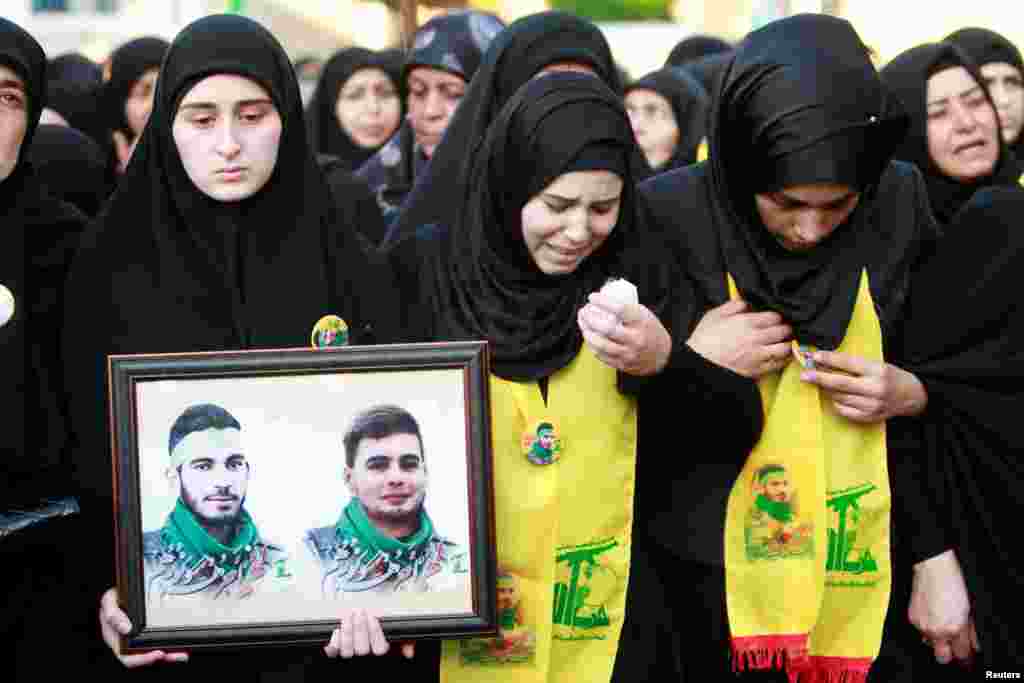 تشییع جنازه پیکارجوی حزب&zwnj;الله لبنان که در حلب سوریه کشته شد. تشییع جنازه وی با حضور خواهرش در دهکده ای در جنوب لبنان انجام شد.