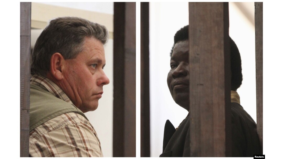 FILE - A combination photo shows Zimbabwean safari operator Honest Ndlovu (R) and fellow countryman and hunter Theo Bronkhorst waiting to appear in Hwange magistrates court, July 29, 2015.