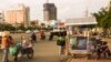 Vietnamese merchants in Ho Chi Minh City are waiting for business, and for the economy, to pick up, Jul. 18, 2013. (VOA - L. Hoang)