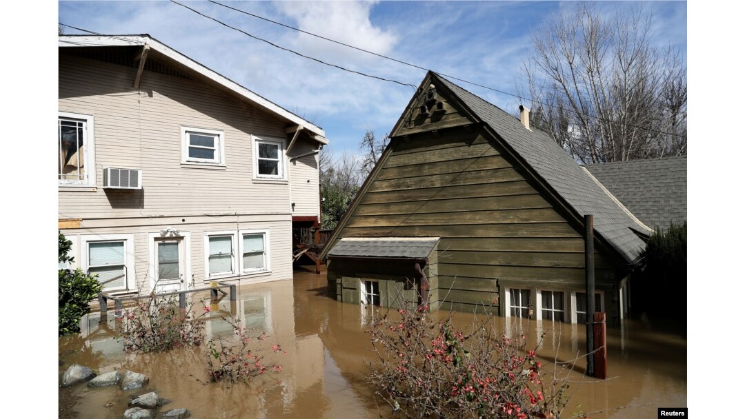 Homes are submerged after Coyote Creek flooded nearby neighborhoods and prompted an evacuation in San Jose, California, Feb. 22, 2017.