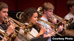 Trombonist Skye Dearborn (center), a member of the 2013 National Youth Orchestra of the United States of America rehearses at SUNY Purchase. (Photo courtesy Chris Lee)