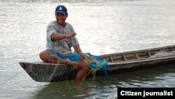 Thai fishman is fishing in Mekong river