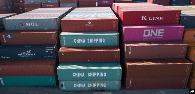 China Shipping Company containers are stacked at the Virginia International's terminal in Portsmouth, Va., May 10, 2019.