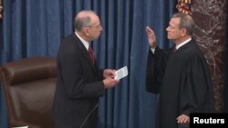  Senator Chuck Grassley (R-IA), the president pro tempore of the U.S. Senate, swears in Chief Justice of the United States John Roberts to preside over the Senate impeachment trial of U.S. President Donald Trump.