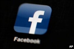 FILE - While Facebook is not selling ads on the Election Day livestreams, it could generate more visits to the site, bolstering its reputation as a destination for live news and pushing back against Twitter, where users often "live-tweet" major events.