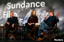 Sundance Film Festival director John Cooper (L-R), executive director Keri Putnam and founder Robert Redford address the media at an opening day news conference for the festival at the Egyptian Theatre in Park City, Utah, Jan. 22, 2015.