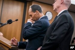 Former Minneapolis police officer Mohamed Noor reads a statement in Hennepin County District Court in Minneapolis, June 7, 2019, before being sentenced by Judge Kathryn Quaintance.