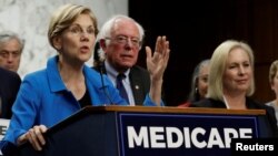 Senator Elizabeth Warren (D-MA) speaks during an event to introduce the "Medicare for All Act of 2017" on Capitol Hill in Washington, Sept. 13, 2017. All three senators have been mentioned as possible contenders for the 2020 Democratic presidential nomination. 