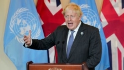 British Prime Minister Boris Johnson speaks to reporters during the 76th Session of the U.N. General Assembly, at United Nations headquarters, in New York, September 20, 2021.