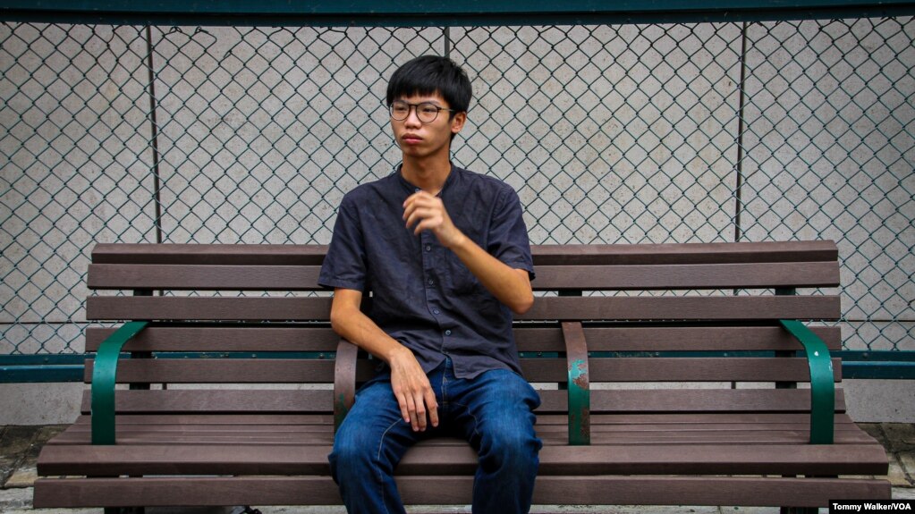 FILE: Activist Tony Chung weeks before he was arrested outside the U.S. Embassy in Hong Kong last year, Oct. 7, 2020. 