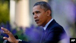 President Barack Obama speaking at the White House about problems with the implementation of the health care law.